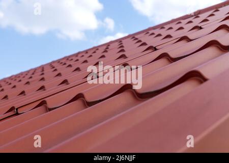 Modern roof made of corrugated metal tiles roofing Stock Photo