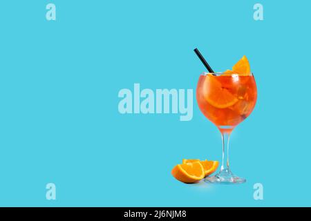 Glass of aperol spritz cocktail on blue background Stock Photo
