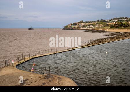 Cold water swimmers at Clevedon Marine Lake on the Severn Estuary, North Somerset, England Stock Photo