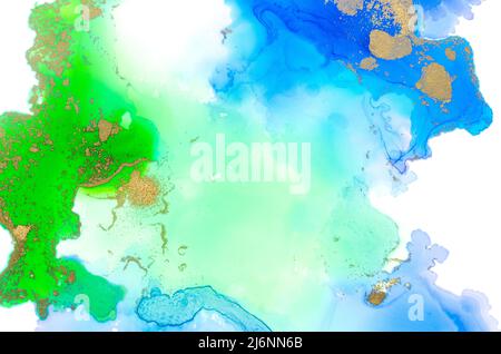 Alcohol-based ink on paper in blue and green colors on white background. Stock Photo