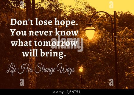 Motivational and inspirational quote - Don't lose hope. You never know what tomorrow will bring. Life has strange ways. Stock Photo