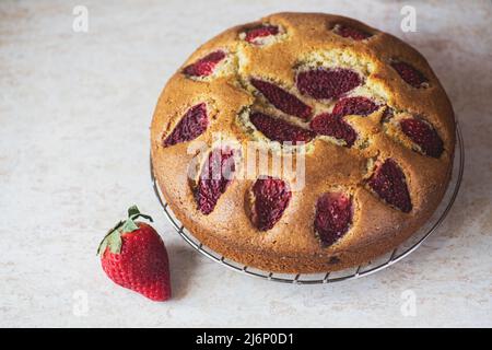 Homemade strawberry sponge cake. Overhead view. Stock Photo