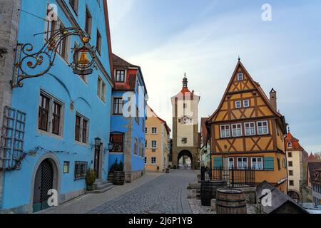 beautiful architecture of romantic Rothenburg ob der Tauber with timbered Fachwerkhaus syle houses in Bavaria Germany . Stock Photo