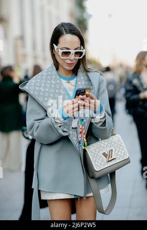Street style, Zeynab El-Helw arriving at Louis Vuitton Fall-Winter