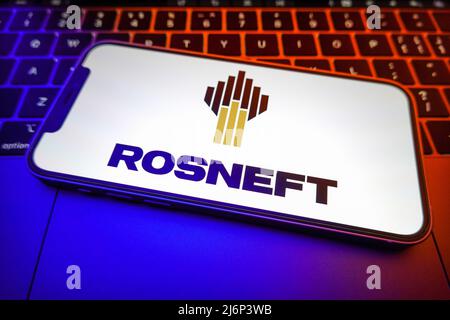 In this photo illustration, a Rosneft Oil logo is displayed on the screen of a smartphone. (Photo by Sheldon Cooper / SOPA Images/Sipa USA) Stock Photo