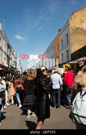 People On The Street Visiting Portobello Road Market In Notting Hill