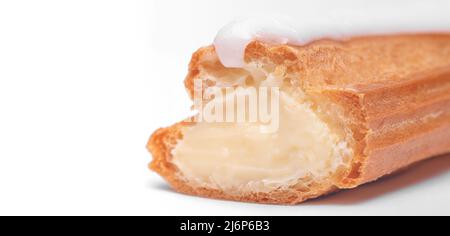 Cake Eclair close-up on a white Stock Photo