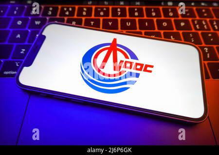 April 29, 2022, China: In this photo illustration, a China National Offshore Oil logo is displayed on the screen of a smartphone. (Credit Image: © Sheldon Cooper/SOPA Images via ZUMA Press Wire) Stock Photo