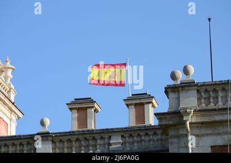 Spanish flag atop the roof of the Royal Palace of Aranjuez Stock Photo