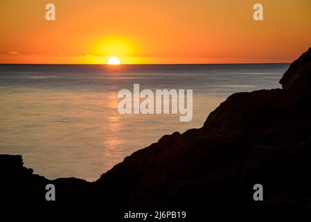 The first sunrise of the year seen from Cadaqués, in Cap de Creus (Empordà, Costa Brava, Gerona, Catalonia, Spain) ESP: El primer amanecer en Cadaqués Stock Photo