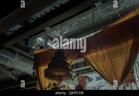 Bangkok, Thailand - Apr 29, 2022 : Architecture interior of Traditional chinese shrine with Traditional chinese lantern at Phutthamonthon sathan or Su Stock Photo