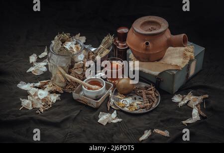 Chinese herbal tea (Jub Lieng). Mixed various herbal dry tea with Blady grass, Lotus leaf, Broken bones tree, Rehmannia glutinosa, Monk fruit sweetene Stock Photo