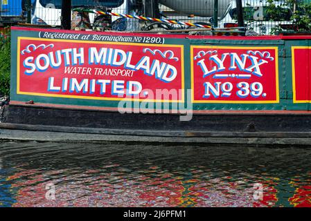 Traditional artwork and hand painted lettering on the side of a narrow boat, Hayes Greater London England UK Stock Photo