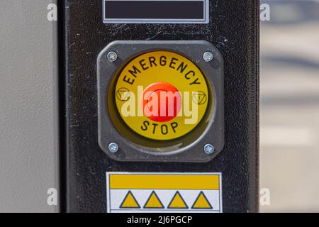 Big Red Emergency Stop Button at Construction Machine Stock Photo