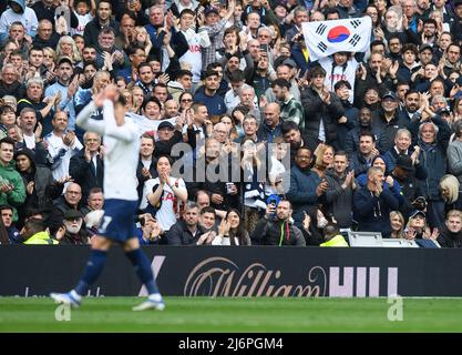 London, UK, 01 May 2022 - Tottenham Hotspur v Leicester City - Premier League - Tottenham Hotspur Stadium  A South Korean Spurs fan salutes Heung-Min Son as he walks off after being substituted during the Premier League match at the Tottenham Hotspur Stadium Picture Credit : © Mark Pain / Alamy Live News Stock Photo