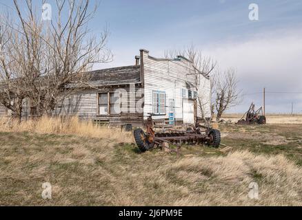 Abandoned wooden garage building in the village of Queenstown, Alberta, Canada Stock Photo
