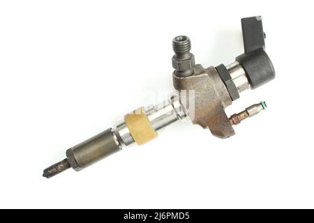Used fuel injector. Rusty diesel engine nozzle part isolated on white background Stock Photo