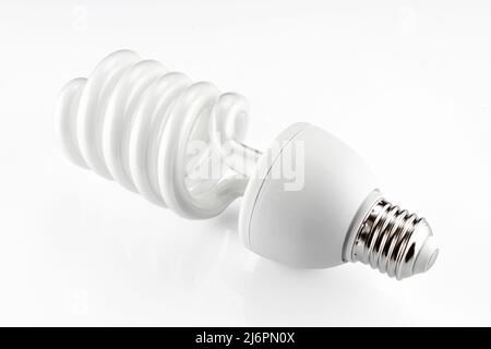 Spiral LED energy-saving light bulb isolated on white background Stock Photo