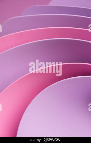 Lavender and pink curved sheets abstract wallpaper. Business pastel background. Stock Photo