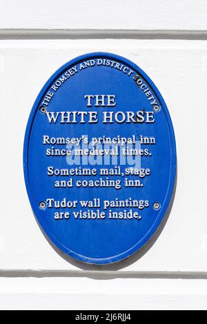 Blue plaque on wall of 14th century The White Horse Hotel, Market Place, Romsey, Hampshire, England, United Kingdom Stock Photo