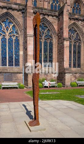 The rusting steel sculpture by John O' Connor sculpture Beyond Limitations, standing the grounds of outside Hereford Cathedral, Hereford, England, UK Stock Photo