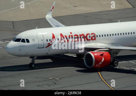 An Avianca Airlines Airbus A320 passenger aircraft taxis at San Francisco International Airport in San Francisco, California. Stock Photo