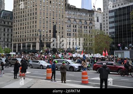 People protest at the 'Rage into action' Abortion-rights rally outside the New York County Supreme Court in Lower Manhattan on May 3, 2022 in New York Stock Photo