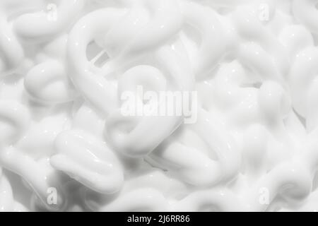 Facial creme, foam, gel or body lotion skincare make up texture sample. Cream swatch swirl smear with shadow isolated. Face makeup creamy cosmetic Stock Photo