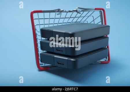 A stack of hard drives in a basket. Stock Photo