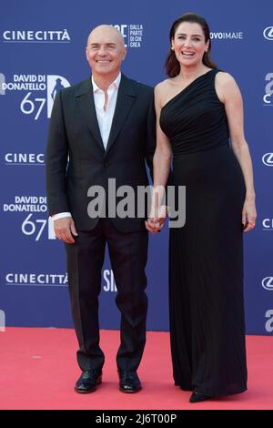 Luca Zingaretti (L) and Luisa Ranieri (R) attend the red carpet of the 67th Premi David di Donatello 2022 at Cinecittà Studios. Stock Photo