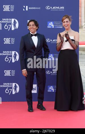 Miriam Leone (R) and Paolo Carullo (L) attend the red carpet of the 67th Premi David di Donatello 2022 at Cinecittà Studios. Stock Photo