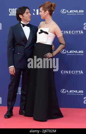 Miriam Leone (R) and Paolo Carullo (L) attend the red carpet of the 67th Premi David di Donatello 2022 at Cinecittà Studios. Stock Photo