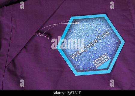 Weathertite waterproof windproof breathable label on purple jacket Stock Photo