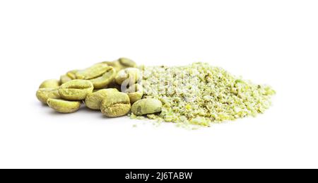 Ground green coffee and coffee beans. Unroasted coffee isolated on a white background. Stock Photo