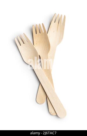 Wooden disposable fork isolated on a white background. Timber biodegradable fork made of natural eco recycle reusable material. Stock Photo