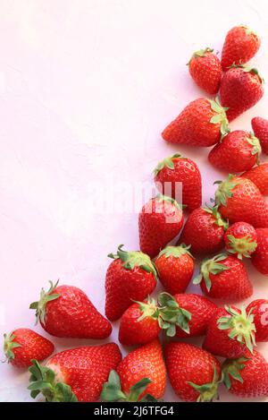 Fresh strawberries pattern on white background. Directly above. Copy space. Stock Photo