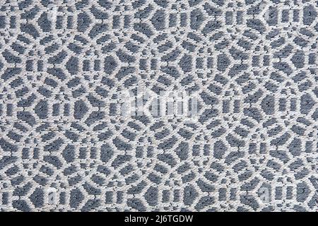 Abstract circular print background on cotton fabric in gray tone Stock Photo
