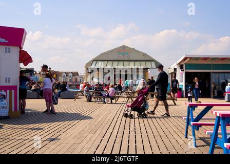 People on the pier at Skegness, Lincolnshire, UK Stock Photo