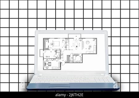 laptop with an architectural floorplan on screen Stock Photo