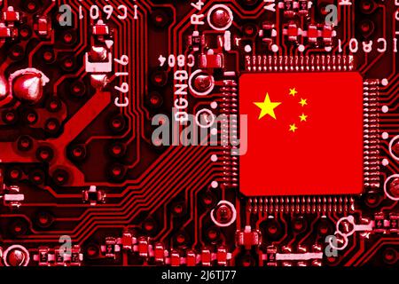 Chinese National Flag overlaid on PC micro chip on integrated circuit board Stock Photo