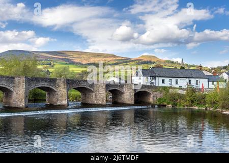 The Crickhowell Bridge, an 18th century arched stone bridge spanning the river Usk in Crickhowell, Brecon Beacons, Powys, Wales. Stock Photo