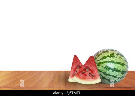 Watermelon with sliced watermelon on a wooden table on a white background. Stock Photo