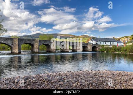 The Crickhowell Bridge, an 18th century arched stone bridge spanning the river Usk in Crickhowell, Brecon Beacons, Powys, Wales. Stock Photo