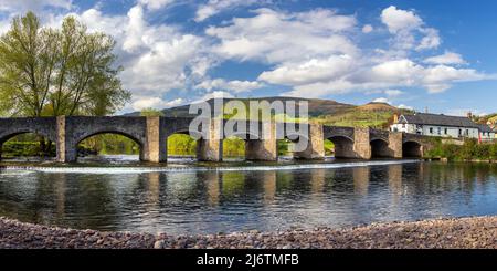 The Crickhowell Bridge, an 18th century arched stone bridge spanning the river Usk in Crickhowell, Brecon Beacons, Powys, Wales. Stock Photo