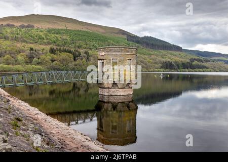 The draw-off tower at Talybont Reservoir in the Brecon Beacons National Park in Wales. Stock Photo