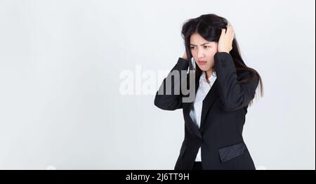 pretty young asian business woman stressed, Difficult to find work, loss of investment. Stock Photo
