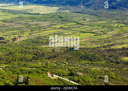 Fields and villages in Konavle region near Dubrovnik. Bird's-eye shot. Stock Photo