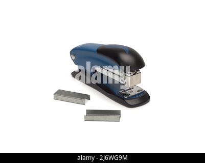 Photo of stapler on a white background and staples nearby Stock Photo