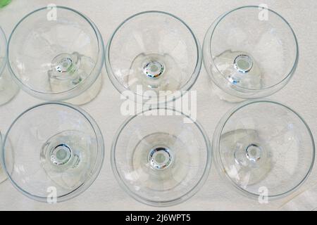 Empty martini glasses on the table. Glassware. Top view Stock Photo