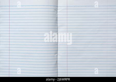 Full page of ruled paper notebook Stock Photo